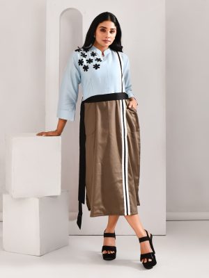 “Golden Muslin light blue and mud brown blended cotton midi dress with floral patchwork yoke and color-block belt.”