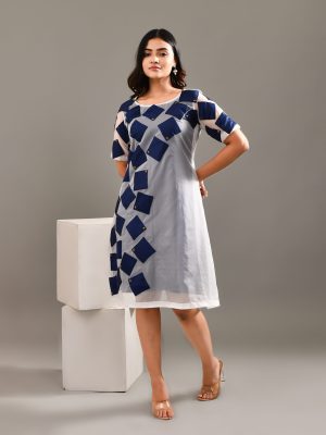 “Golden Muslin grey and blue blended cotton and organza sheer dress with vibrant geometric patchwork detailing.”