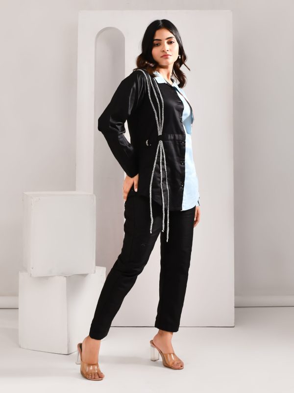 “Golden Muslin black and sky-blue blended cotton shirt with contrasting thread surface detailing.”