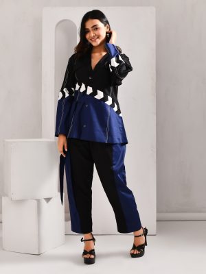 “Golden Muslin deep blue and black blended cotton jacket-style co-ord set with waist tie belt and straight-leg pants.”