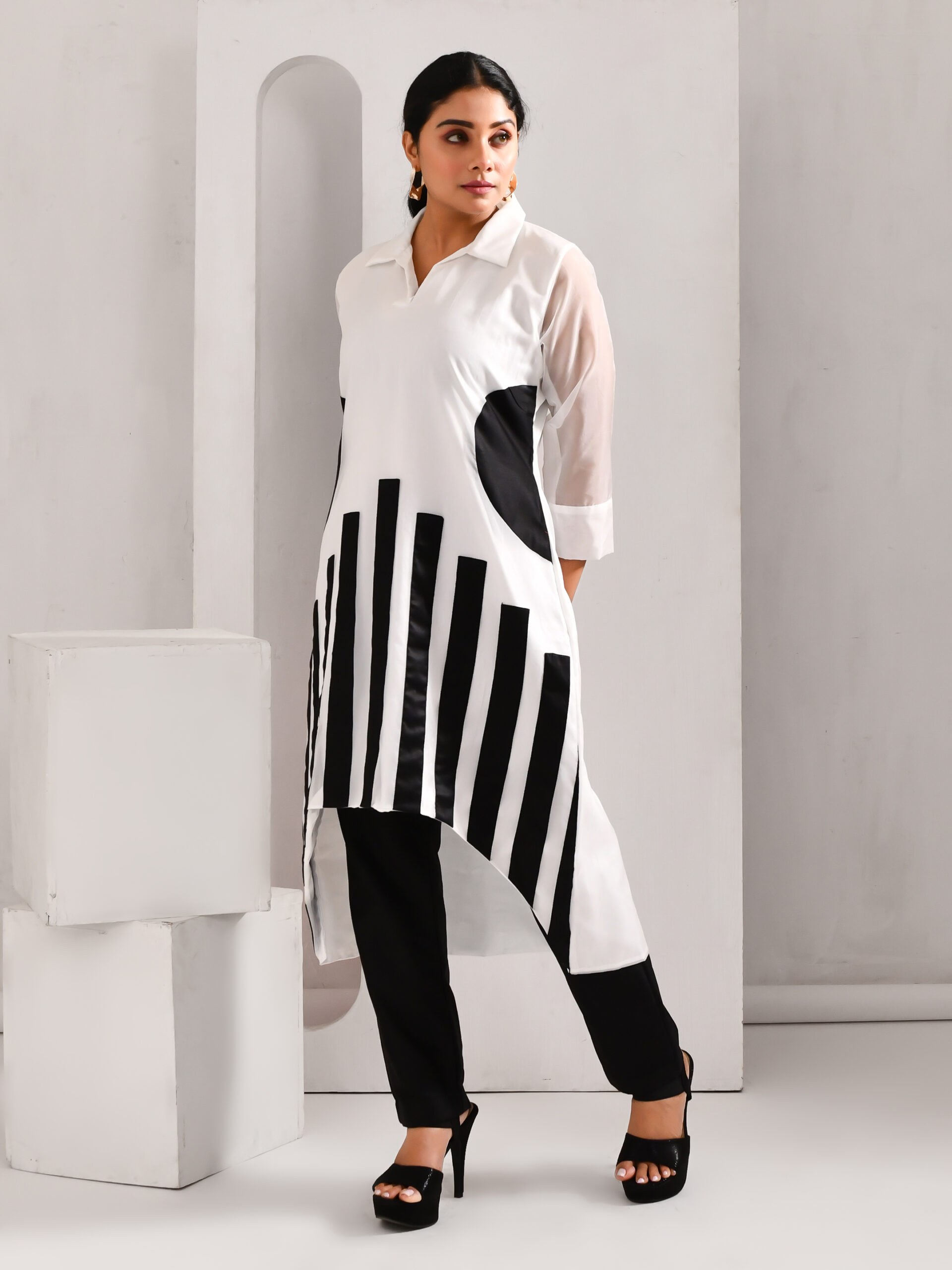 White and black patchworked blended cotton and organza collared top with relaxed fit paired with elastic-waist pants – Golden Muslin
