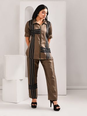 “Golden Muslin khaki brown blended cotton co-ord set with delicate weave geometric pattern and front zip detailing.”