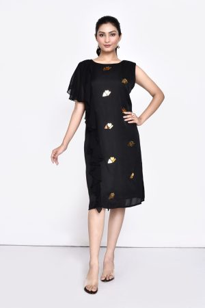Golden Muslin Jaanvi Mohta black silk blend shift dress with organza ruffles and chunky gold embellishments