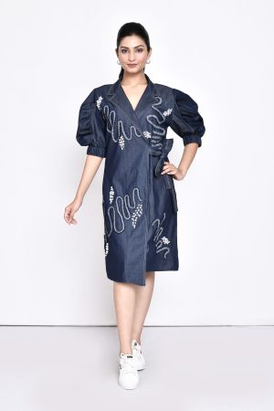 Golden Muslin overlap denim dress with tie-up belt, stylized sleeves, lapel collar, and pearl and denim embellishments