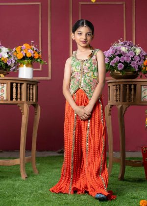 Green embroidered jacket-style sleeveless blouse with mirror work and tassels paired with orange crinkled sharara pants with vertical mirror detailing – Golden Muslin