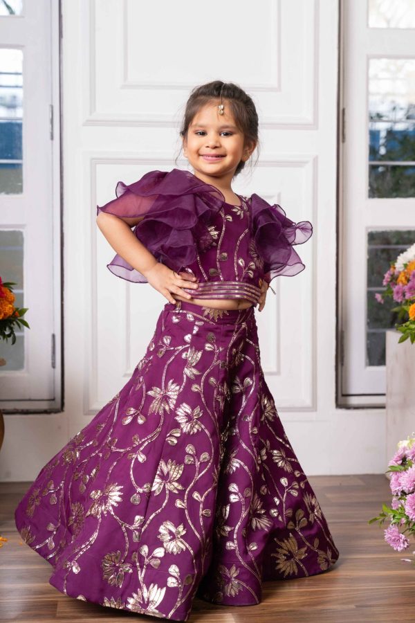 Purple organza girls’ lehenga set with gold floral gota embroidery, ruffle-sleeve crop blouse, matching lehenga, and dupatta – Golden Muslin
