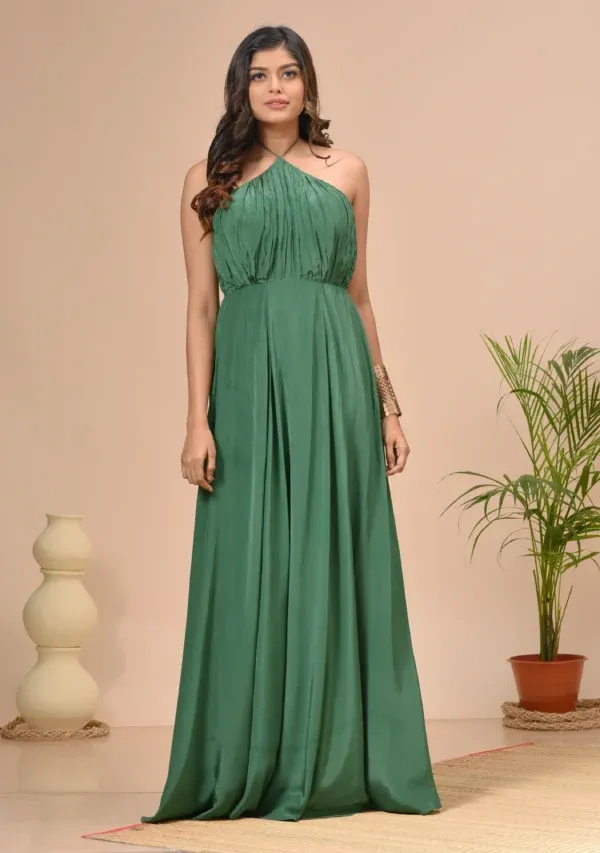 Hunter green satin halter neck maxi dress with yoke gathers By Kumar Rahul from the house of Golden Muslin.
