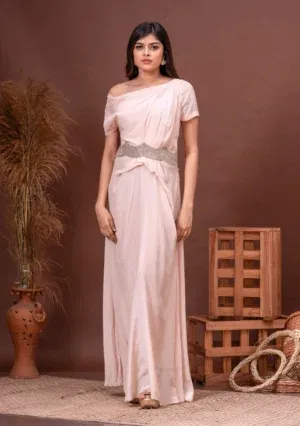 Champagne pink habutai silk drop shoulder gown with waist embroidery from the house of Golden Muslin by Kumar Rahul.