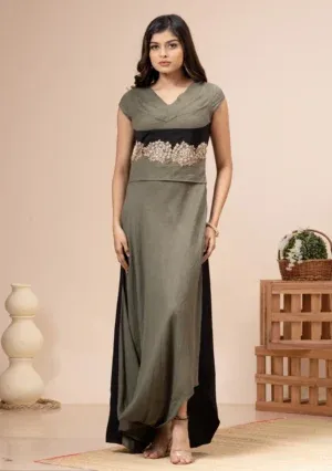 Olive green linen cotton pleated cowl gown with waist embroidery By Kumar Rahul from the house of Golden Muslin.