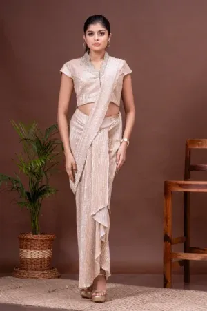 White gold shimmer pre-draped saree and embroidered blouse by Kumar Rahul from the house of Golden Muslin.