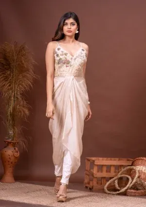 Beige zari kota doriya draped dress with floral zardosi on the bodice from the house of Golden Muslin by Kumar Rahul.