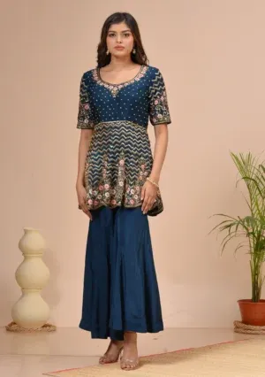 Midnight green peplum kurta with zardosi and cutdana work By Kumar Rahul from the house of Golden Muslin.