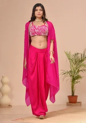 Fuchsia crepe draped skirt and beaded georgette bustier from the house of Golden Muslin by Kumar Rahul.