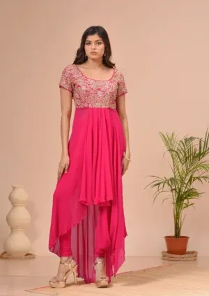 Coral georgette scoop neck tunic with an embroidered bodice and pleated hem from the house of Golden Muslin by Kumar Rahul.