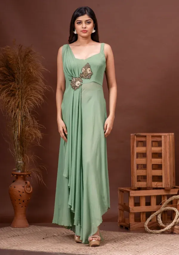 Dusty jade georgette dress with drape detailing and placement embroidery from the house of Golden Muslin by Kumar Rahul.