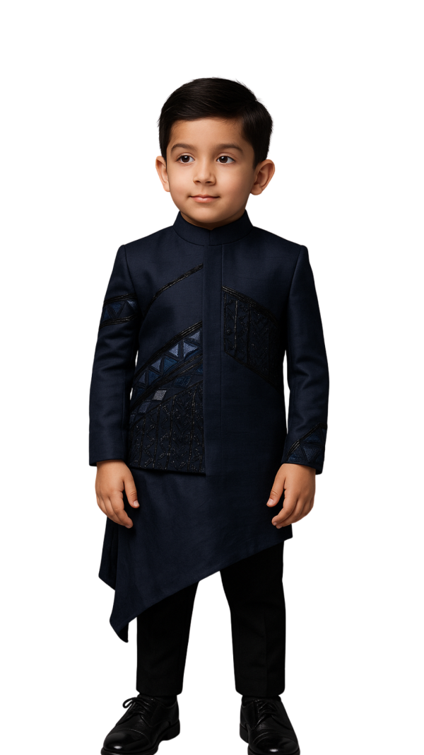 Golden Muslin boys’ ink blue linen satin asymmetrical Nehru jacket set with tonal geometric embroidery, paired with matching asymmetric kurta and pants.