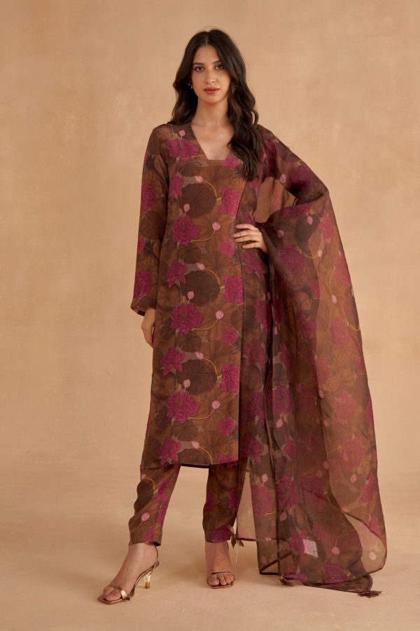 Golden Muslin walnut-brown crepe silk V-neck kurta with signature lotus print, paired with matching lotus-printed tapered pants and organza dupatta with printed detailing.