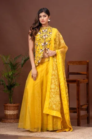 Yellow embroidered Bamberg silk jacket with organza sharara by Satya JB from the house of Golden Muslin.