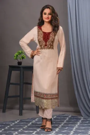 Peach Bamberg silk kurta with intricate embroidery From the house of Golden Muslin By Satya JB paired with cotton pants.