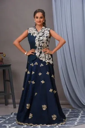 Embroidered Persian blue Bamberg silk skirt with scallop edges and a navy raw silk jacket by Satya JB from the house of Golden Muslin.