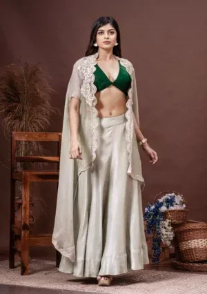 Mint green silk organza cape and velvet blouse from the House of Golden Muslin by Satya JB with a scalloped hem.