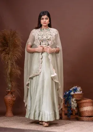 Mint green silk organza cape with scalloped embroidery and dola blouse from the house of Golden Muslin by Satya JB.