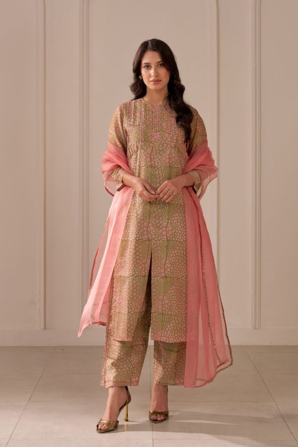 “Golden Muslin olive green mandi block-printed straight kurta with pin tucks, paired with wide-leg Chanderi pants with side pleats and blush pink organza dupatta with mandi block print.”