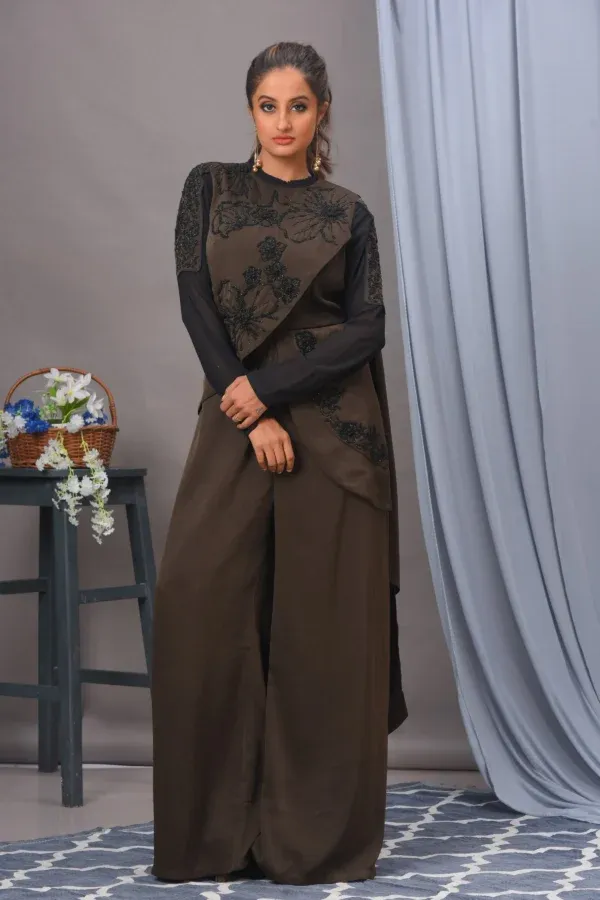 Indo-fusion jumpsuit by Vivek Kumar from Golden Muslin with cutdana work and shoulder drape detail.