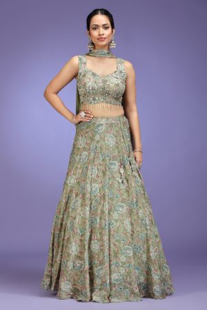 Golden Muslin sage green floral printed viscose embroidered lehenga set with sleeveless embellished blouse