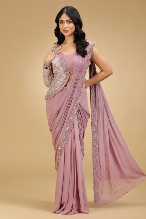 Golden Muslin dusty pink georgette pre-draped saree with butti embroidered blouse and one-sided embroidered jacket