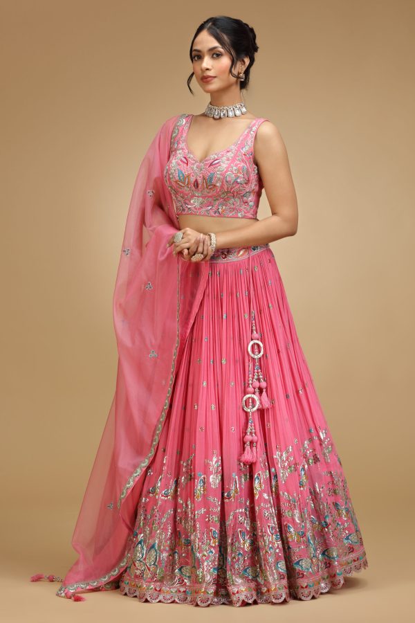 Golden Muslin pink tissue embroidered lehenga set with sleeveless embroidered blouse