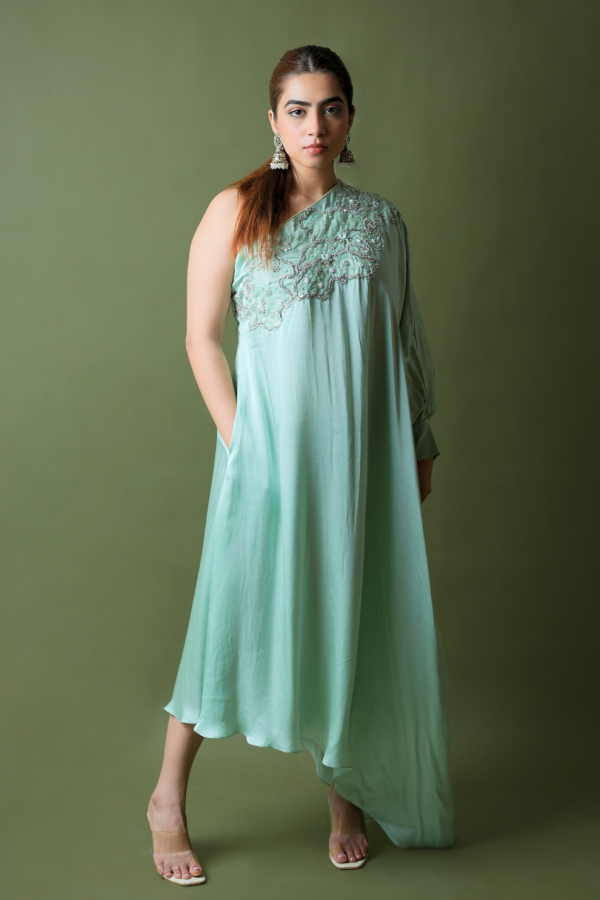 Sage green one-shoulder asymmetrical satin dress by Golden Muslin featuring an embroidered bodice