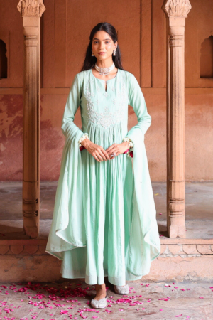 Sage green Chanderi and organza kalidar kurta with matching dupatta by Golden Muslin