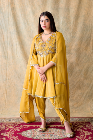 Mustard yellow linen silk and organza embroidered Anarkali kurta set by Golden Muslin