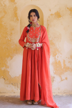 Rust orange Chanderi and organza kalidar kurta with matching dupatta by Golden Muslin