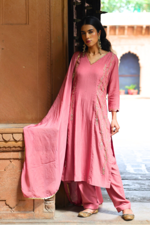 Dusky rose three-piece ensemble by Golden Muslin featuring a V-neck kurta with gold floral embroidery