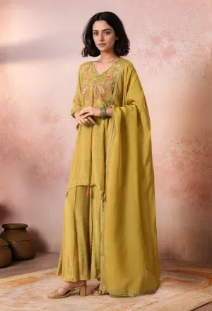 Mehendi green chinnon embroidered sharara set with asymmetric kurta, detailed yoke embroidery, tassel accents, matching sharara, and organza dupatta, offering contemporary festive elegance, Golden Muslin by Jhambthreads.