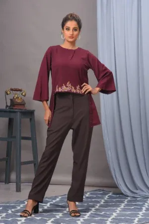 Wine crepe embellished top with matching pants set by Golden Muslin, crafted with refined detailing for a modern festive look.