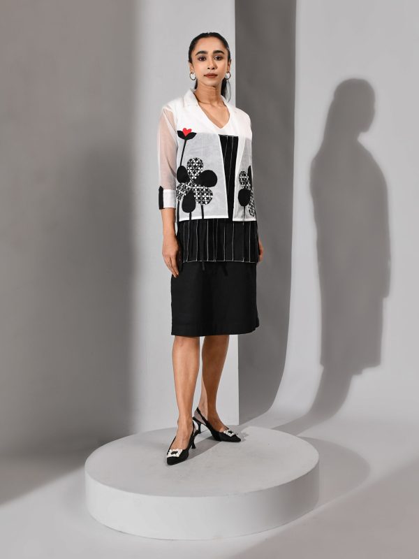 Black-and-white cotton pleated dress with sheer organza jacket and embroidered black patchwork – Golden Muslin
