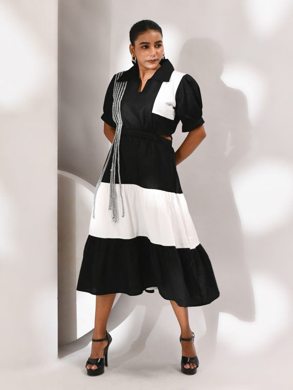Black and white tiered cotton dress with puff sleeves