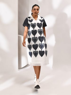 White organza dress with heart-shaped patches on the front and striped back