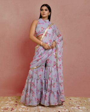 Grey pre-draped floral printed chiffon sharara saree with gota patti lace detailing and high-neck blouse finished with delicate lace accents in Golden Muslin by Priyanka Rathore