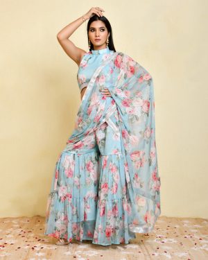 Blue pre-draped floral printed georgette sharara saree with lace detailing and high-neck sleeveless blouse in Golden Muslin by Priyanka Rathore