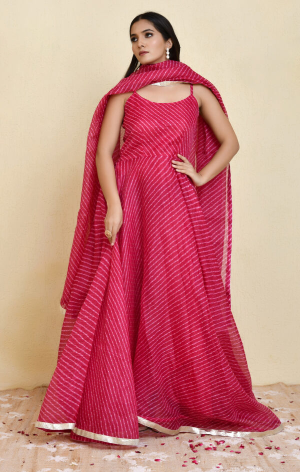 Magenta Kota Doria leheriya print floor-length anarkali with gota lace borders and matching dupatta from Golden Muslin by Priyanka Rathore.