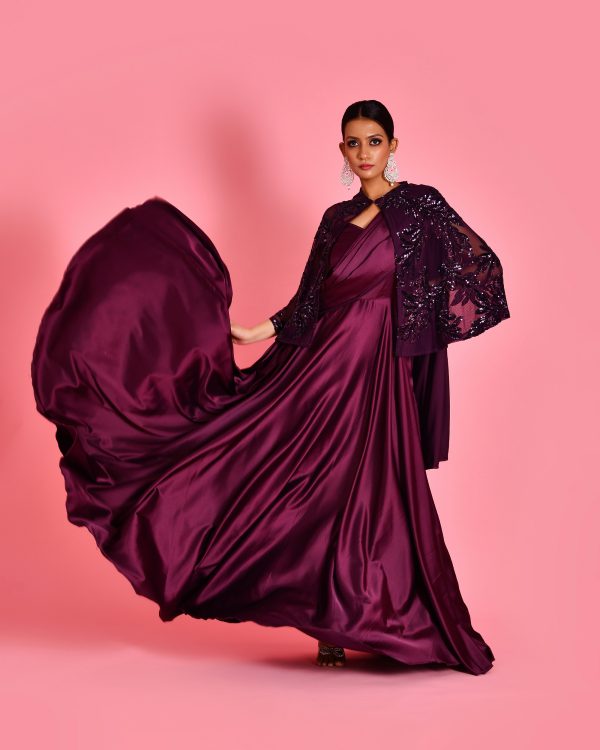 Golden Muslin wine satin gown saree with embroidered cape by Priyanka Rathore