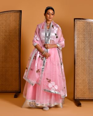Golden Muslin pastel pink lehenga with gota embellishments and hand painted dupatta by Priyanka Rathore