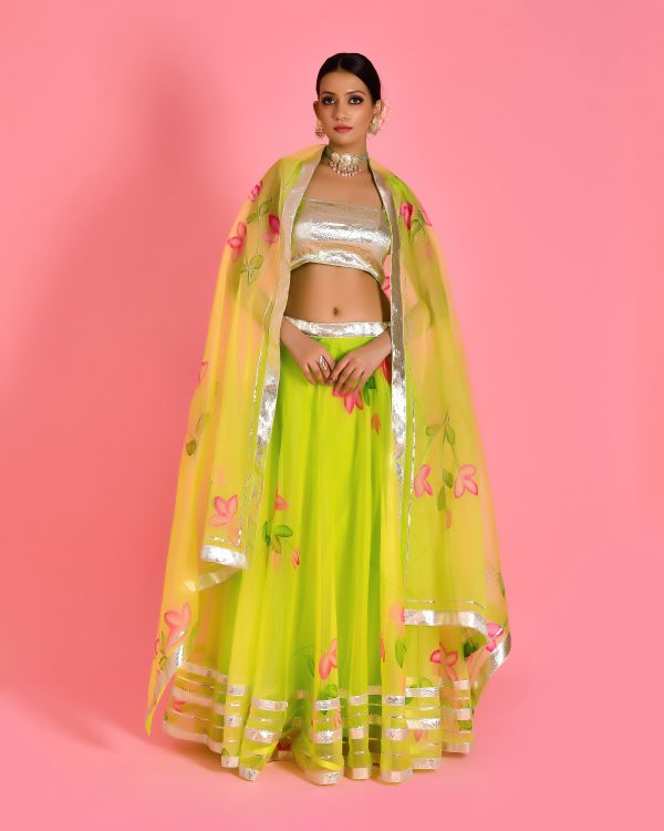 Golden Muslin lime green hand painted lehenga with gota embellishments by Priyanka Rathore