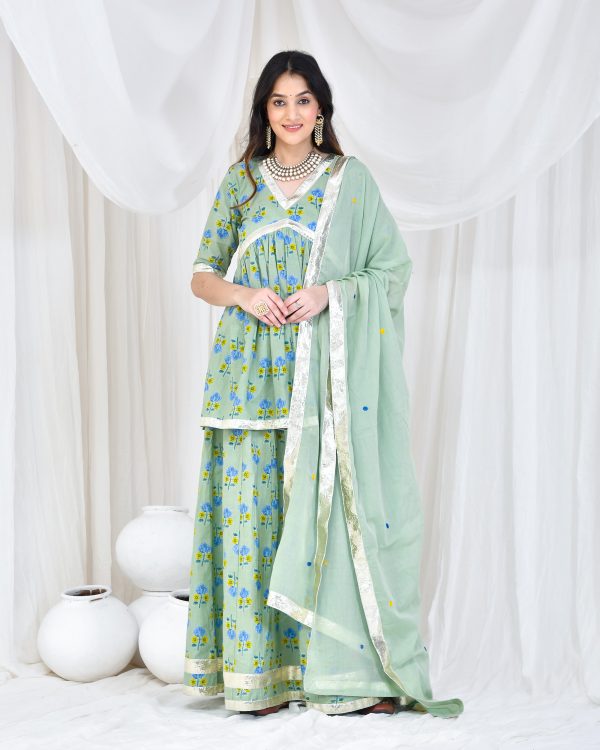 Soft mint green cotton hand block printed skirt set in Golden Muslin by Priyanka Rathore with aari embroidered mulmul dupatta