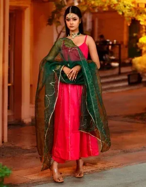 A striking magenta cotton silk Anarkali featuring intricate gota work and a flowing silhouette from Golden Muslin by Priyanka Rathore, designed for festive elegance.