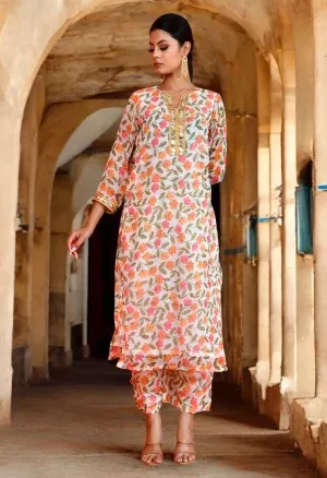 Soft off-white chiffon kurta set with delicate floral prints and an airy silhouette from Golden Muslin by Priyanka Rathore, ideal for elegant ethnic styling.